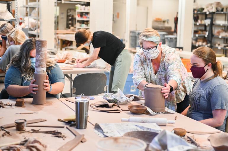 UTC OTD students in clay class with Dr. Cruz