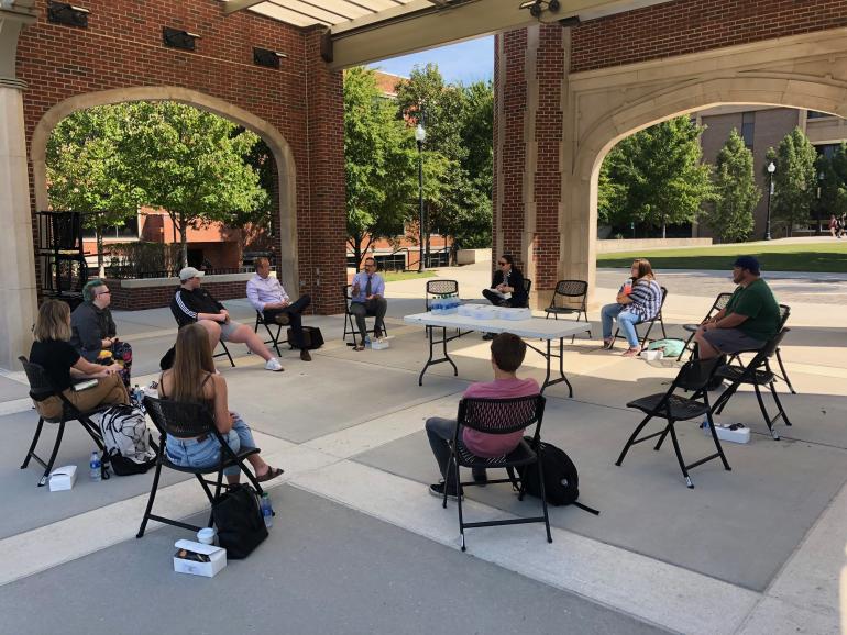 Students sitting in circle at Chamberlain