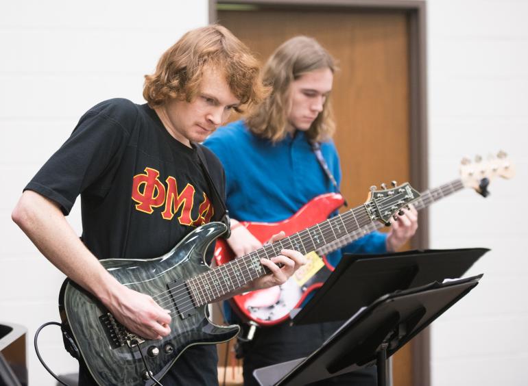 UTC students with electric guitars