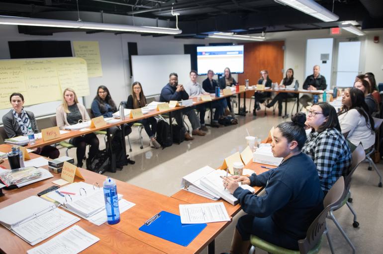 Classroom of students around a rectangular table