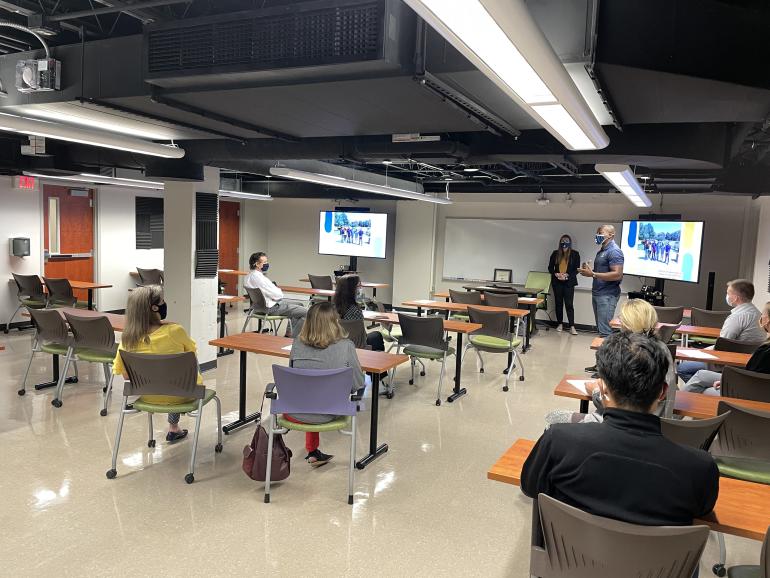 Students in a classroom listening to a lecture