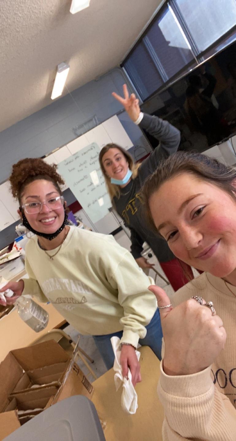 Three female students posing for a selfie