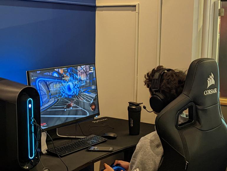 A member of the UTC Rocket League team competes in a match in the University Center Esports & Gaming Facility 