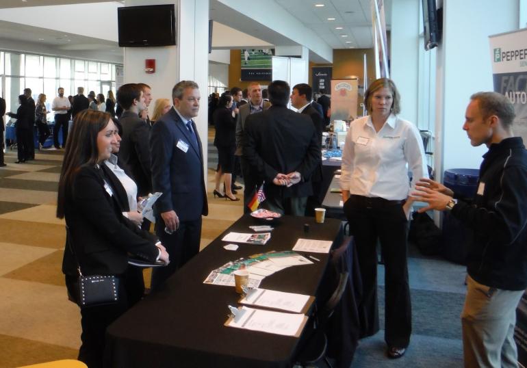 Students and employers interact during a career fair.