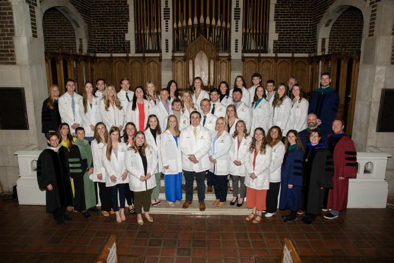 UTC DPT 2025 White Coat Group Photo with faculty