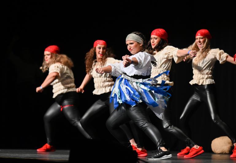 5 members of Delta Zeta perform in Lip Sync routine 