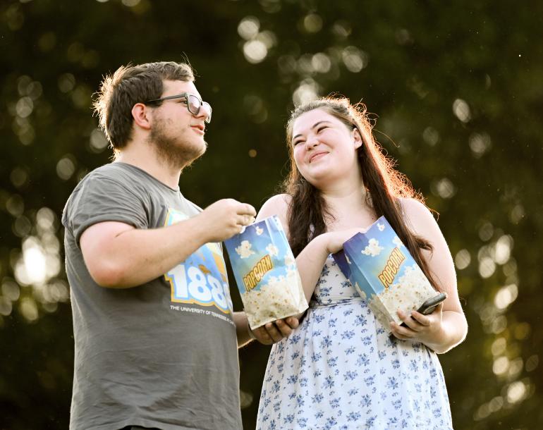 Students eating popcorn 