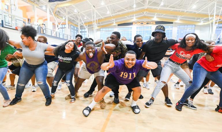 Students dancing at an orientation event