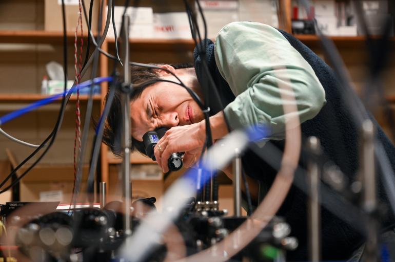 Dr. Tian Li in Quantum Physics Lab at Grote Hall Dr. Tian Li in Quantum Physics Lab at Grote Hall
