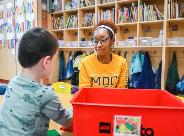 UTC Education (Licensure) student working with a student