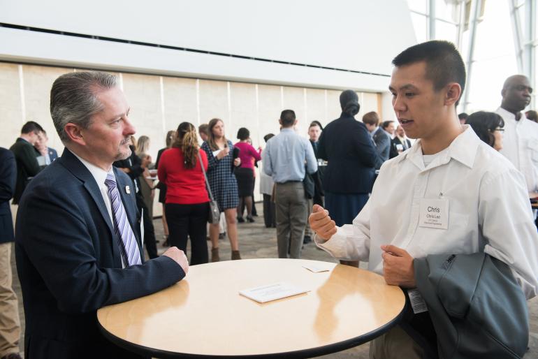 Rollins College of Business student at Hunter Mixer Business student at a networking event