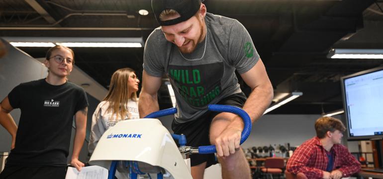 HHP Sports Lab of a guy on a bike.