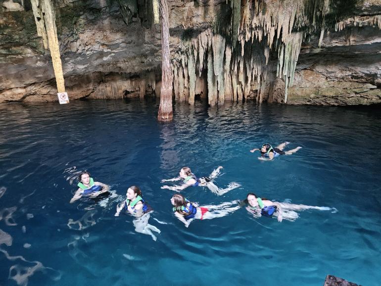 Students enjoying a swim at Cenotes Santa Barbara