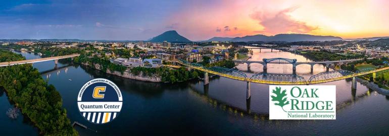 Chattanooga on the Tennessee River at dusk Aerial view of Chattanooga on the Tennessee River at dusk with Quantum Center and Oak Ridge National Laboratory logos in the corners.