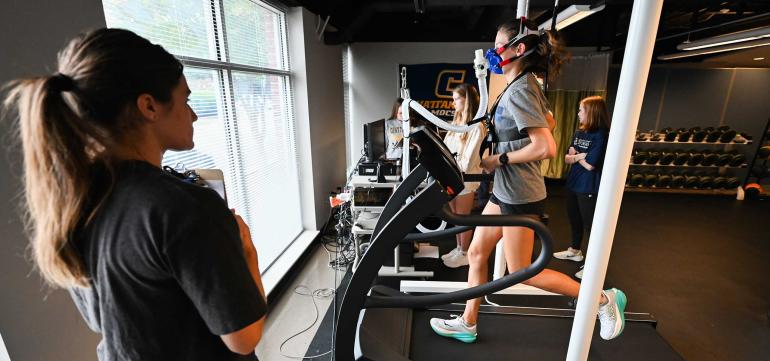 HHP Sports Lab girl running on a treadmill