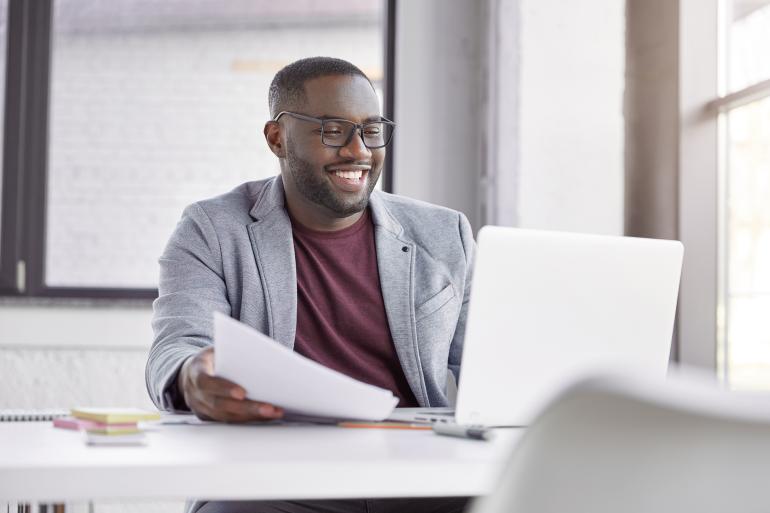 man looking at computer