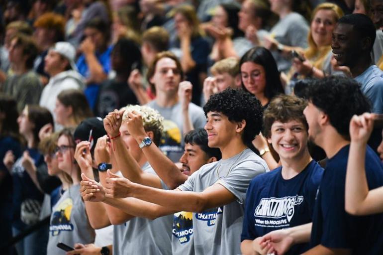 students cheering at a UTC pep rally