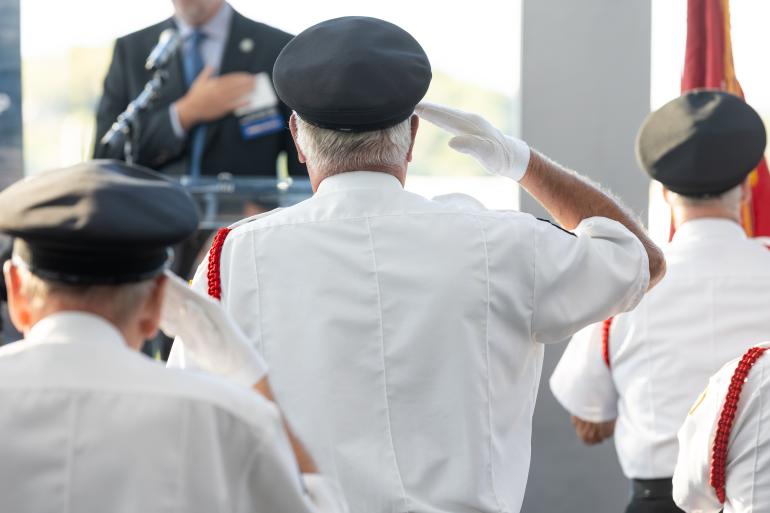 Color guard saluting