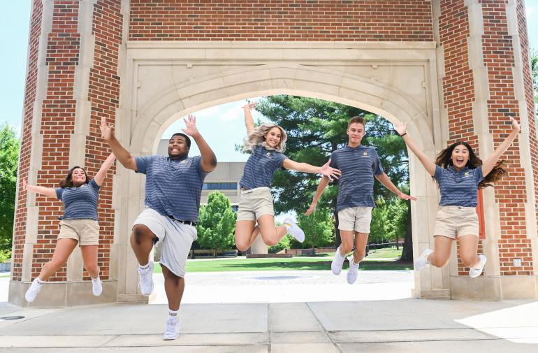 Students Jumping on Chamberlain Field at UTC 
