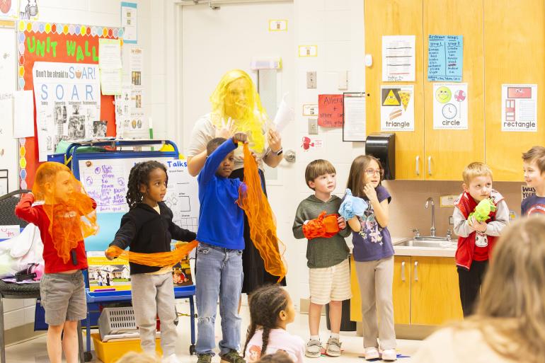 Teacher and students participating in classroom residency with ABC