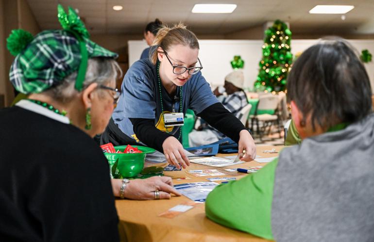 Occupational Therapy student with older adults in the Bradley-Cleveland Senior Center