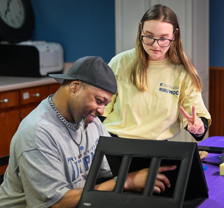 Occupational Therapy Student helping patient