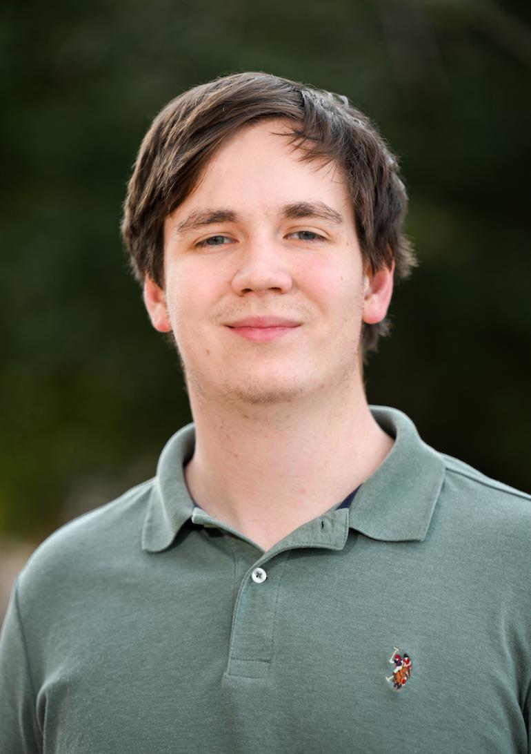 Professional headshot of Kestutis.