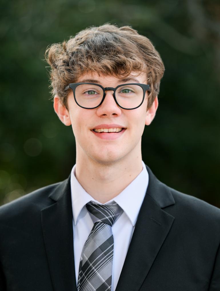 Professional headshot of Chandler
