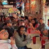 Students gather at Champy's, a fried chicken restaurant