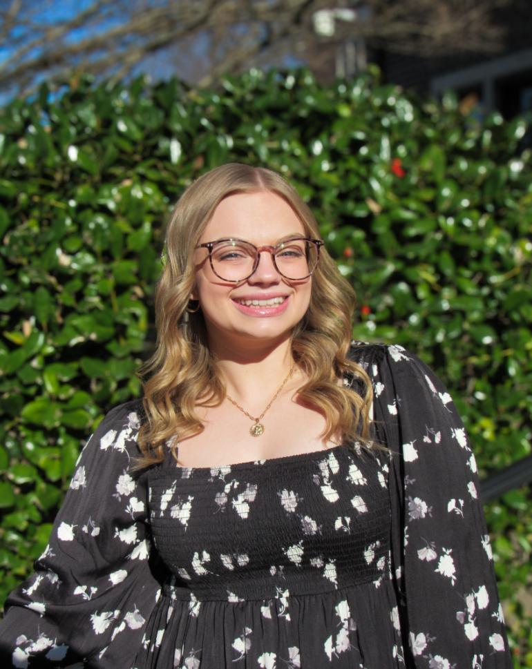 Professional headshot of Paige