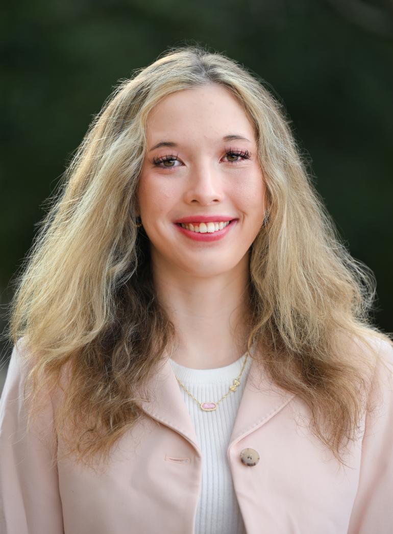 Professional headshot of Juliet