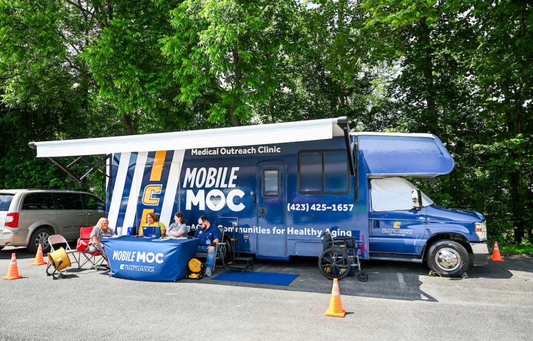 MobileMOC bus with staff outside