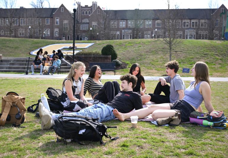 Students sitting outside