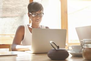 Woman typing at a desk
