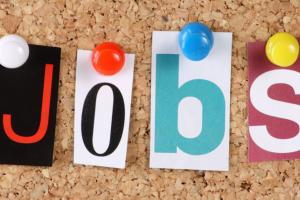 Jobs paper letters on cork board