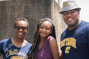 A student and her parents