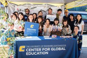 JFOU students have a booth for Parking Day. 