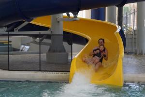 Pool Party - Slide Show - June 2023 - Family on Slide