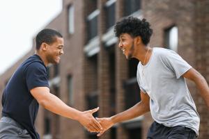 UTC students UTC students shaking hands on campus