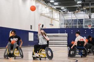 Students in wheelchairs engaging in physical activities