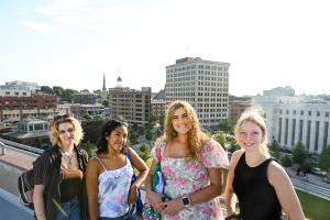 UTC Honors Programs UTC Honors students standing in front of the Chattanooga city skyline