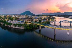 Aerial of Chattanooga along the Tennessee River at dusk. Aerial of Chattanooga along the Tennessee River at dusk.