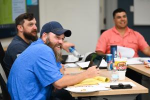 UTC adult students sitting at a table
