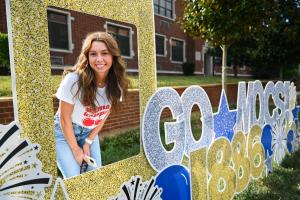 UTC Transfer pathways UTC student in a Go Mocs cutout