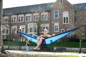 Campus life at UTC UTC female student outdoor in a hammock