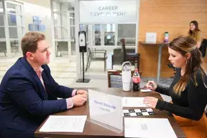 Moc Interview Week UTC student practices job interview skills.
