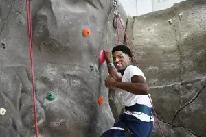 Orientation Leader Orientation leader takes time out for recreational rock climbing.