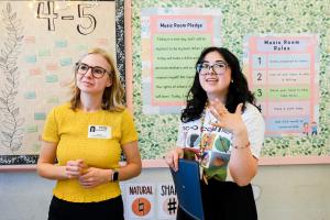 Two female UTC students in an elementary school classroom