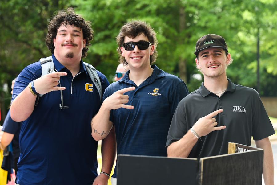 UTC Orientation UTC students holding up the Power C hand gesture