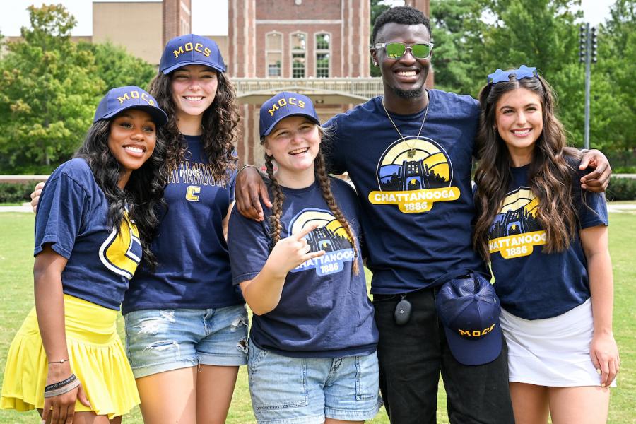 UTC students wearing blue and gold swag on Chamberlain Field